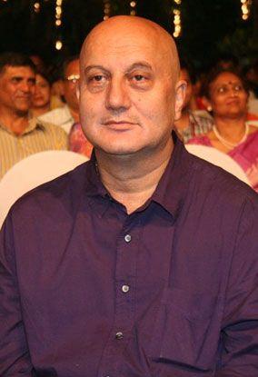 Anupam Kher Gets A Quick Haircut From Brother Raju Kher See Their ROFL  Video