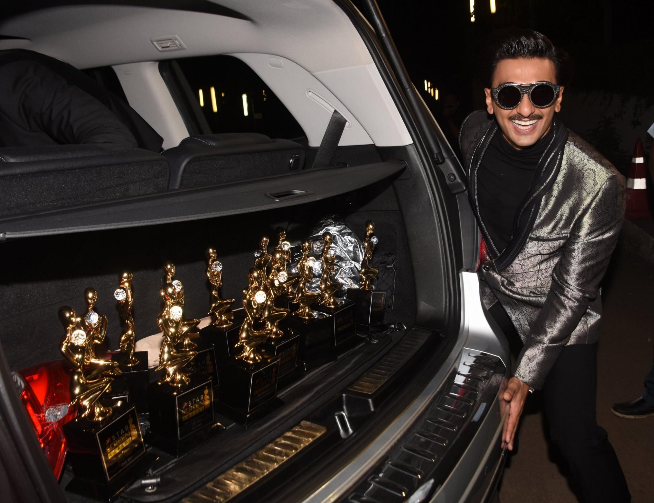 Ranveer Singh Gives A Peek At His Car's Boot; You Wouldn't Believe What's  Inside - Award Trophies, Y'all