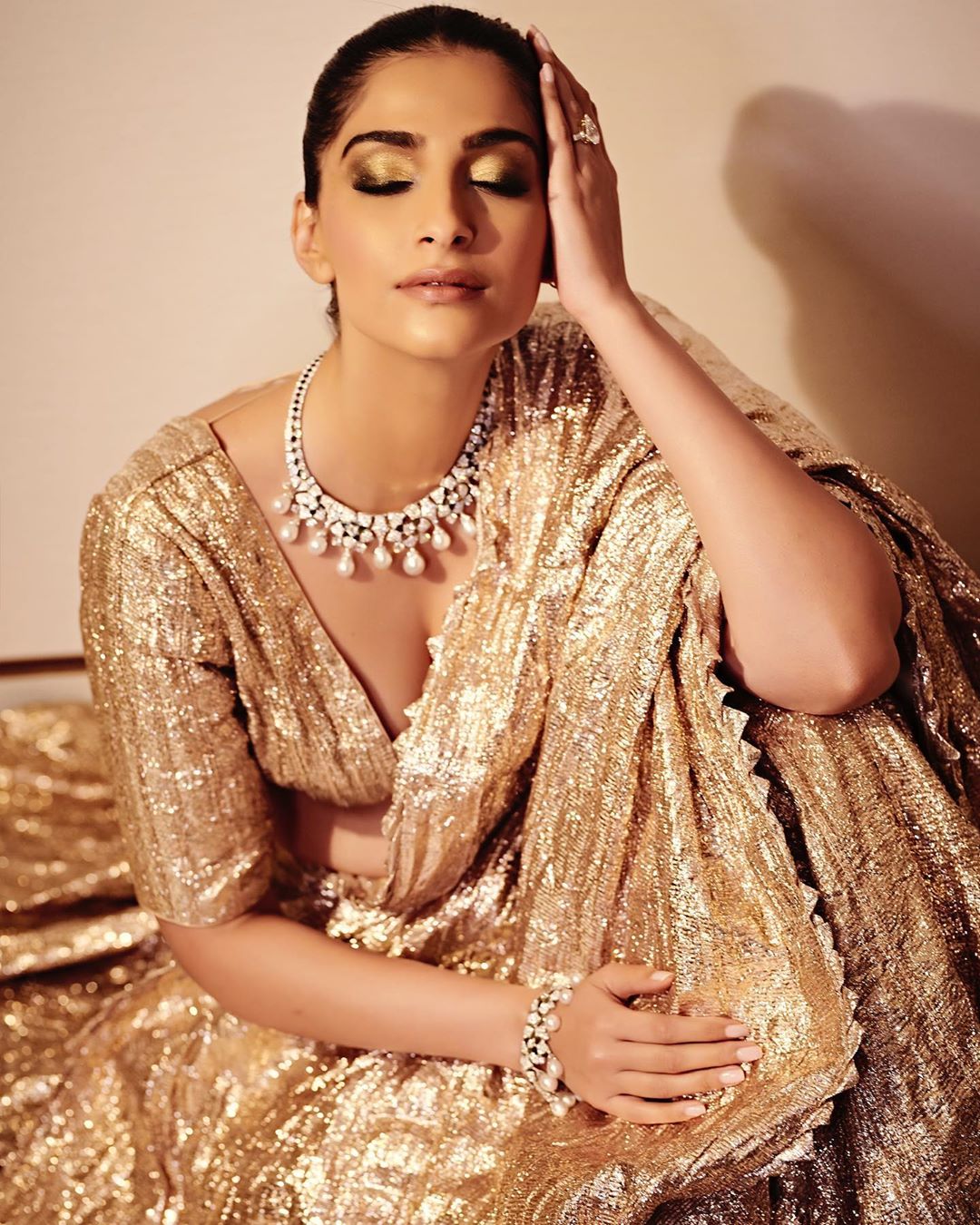 Sonam Kapoor Glistens in Gold for Latest Pictures - Masala