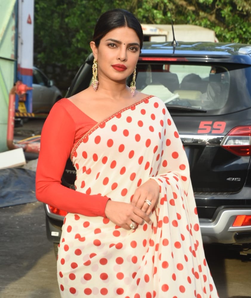 Priyanka Chopra made quite a statement at the opening of Jio World Plaza in  an eye-catching neon @sabyasachiofficial saree! 😍 Styled by - … | Instagram