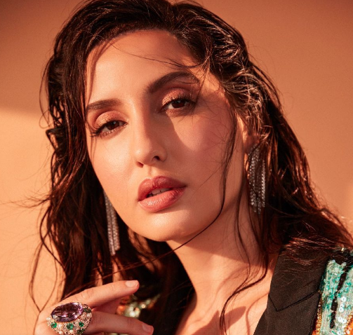 Nora Fatehi's fan who tattooed her face on his arm is feeding