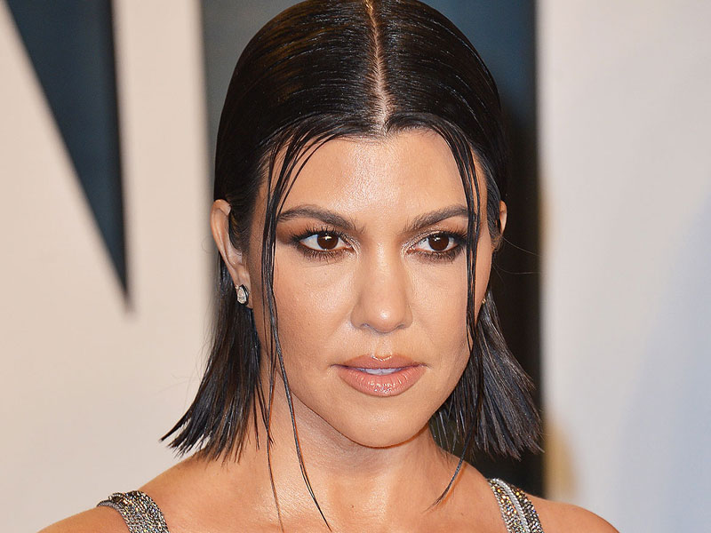 Kourtney Kardashian flaunts baby bump in green bikini - Masala