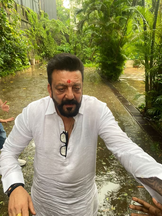 Sanjay Dutt nails the "Vaastav" look for his 64th birthday as he greets fans - See ALL the pics here